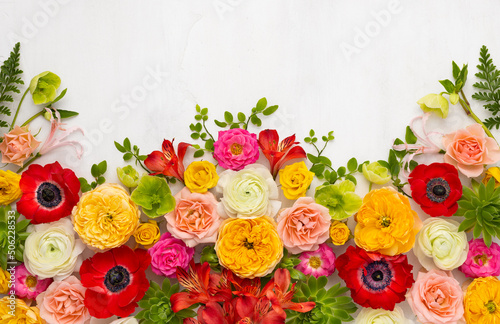 Beautiful flowers composition. Arrangement of anemones, roses, ranunculus, tr...