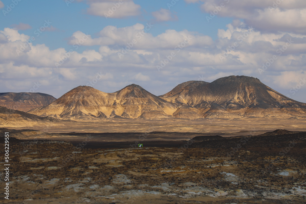 Panoramic View to the Sandy Hills in the Black Desert, is National park in the Farafra Oasis, Egypt Panoramic View to the Sandy Hills in the Black Desert, is National park in the Farafra Oasis, Egypt