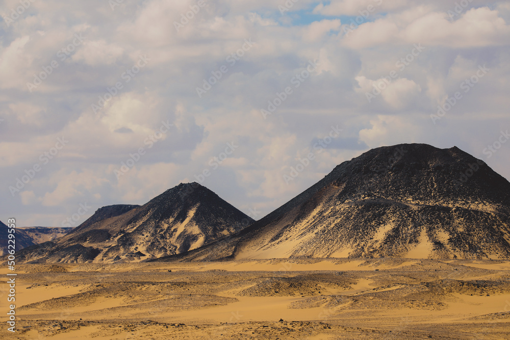 Panoramic View to the Sandy Hills in the Black Desert, is National park in the Farafra Oasis, Egypt