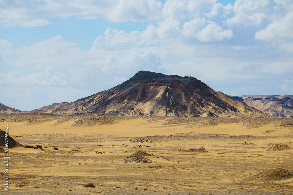 Panoramic View to the Sandy Hills in the Black Desert, is National park in the Farafra Oasis, Egypt