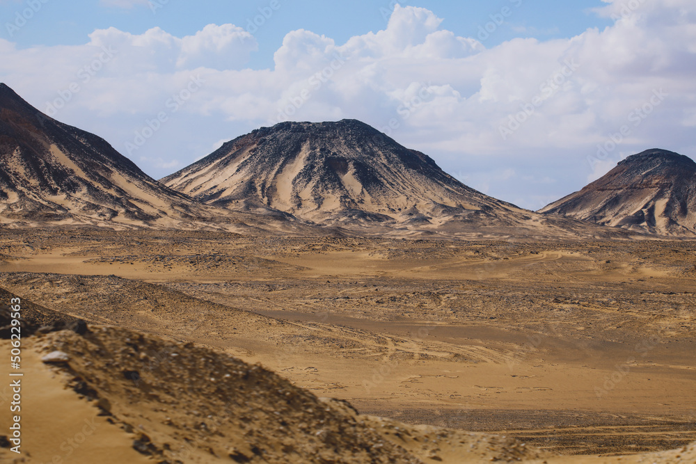 Panoramic View to the Sandy Hills in the Black Desert, is National park in the Farafra Oasis, Egypt Panoramic View to the Sandy Hills in the Black Desert, is National park in the Farafra Oasis, Egypt