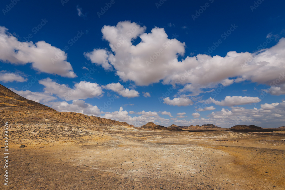 Panoramic View to the Sandy Hills in the Black Desert, is National park in the Farafra Oasis, Egypt