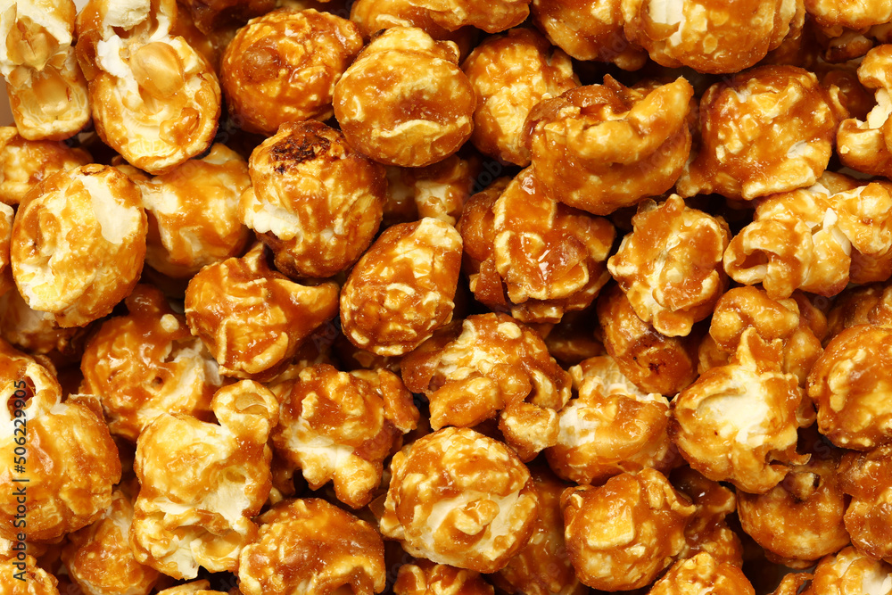 Caramel sweet popcorn texture, top view, flat lay