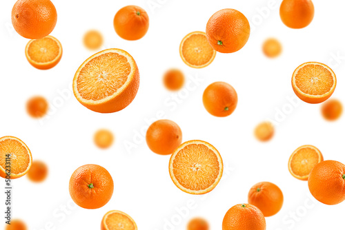 Falling orange isolated on white background, selective focus