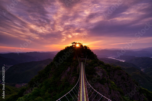 Skybridge between the mountain peaks during sunrise