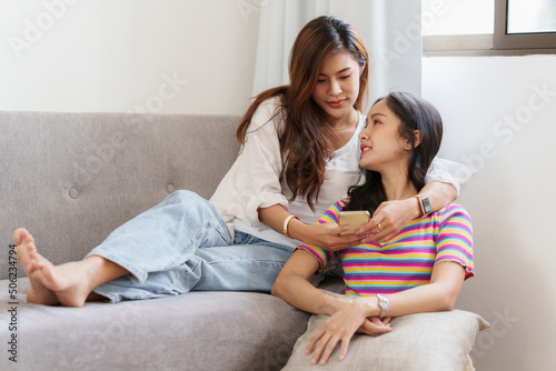 Young Asian Women LGBT lesbian couple love moments happiness at bedroom. LGBTQ or Gay and pride concpet.