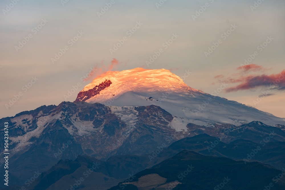 The Cayambe volcano in Ecuador at sunset