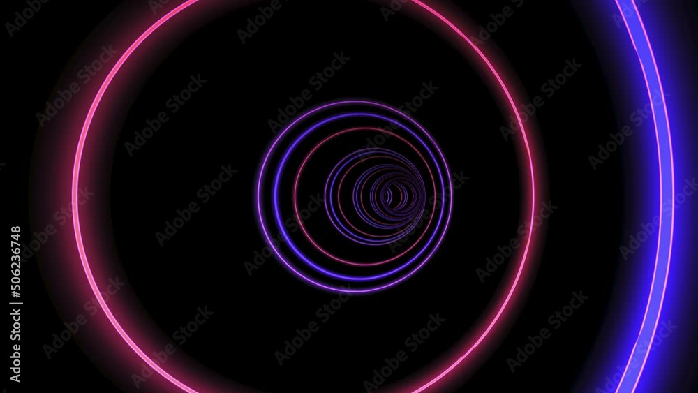 Movement through the tunnel of colorful neon rings Movement through the tunnel of colorful neon rings