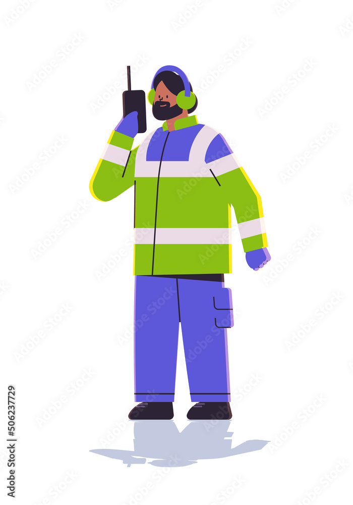 aviation marshaller in uniform using walkie talkie man air traffic controller airline worker in signal vest professional airport staff