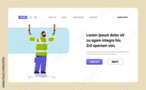aviation marshaller signaling near aircraft air traffic controller airline worker in signal vest professional airport staff
