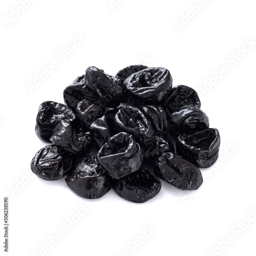 a small pile of fresh prunes lies isolated on a white background