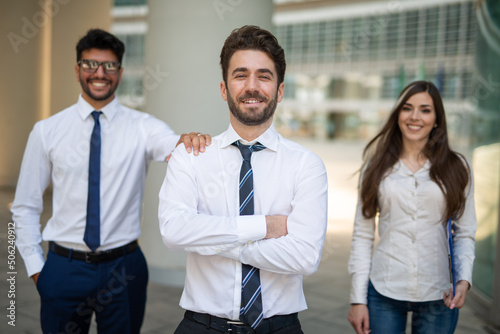 Group of smiling business people © Minerva Studio