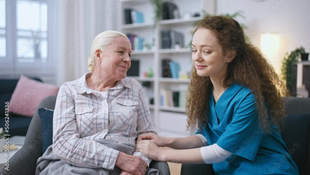 Portrait of nurse and senior woman in retirement home, elderly care facility Portrait of nurse and senior woman in retirement home, elderly care facility