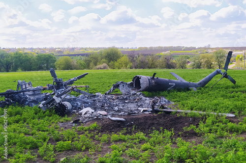 Kharkiv, Ukraine - May 15, 2022: The wreckage of the destroyed helicopter of the Russian Russian occupiers in Kharkiv and Kharkiv region. War in Ukraine photo