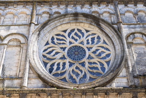 Cognac, France - April 25, 2022: Closeup of rose window form chuch St Leger in Cognac in Charente France