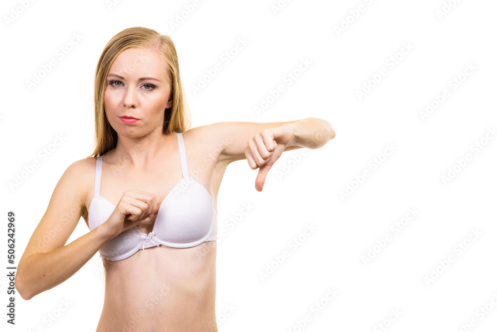 Woman dissatisfied with size of bra breasts Woman dissatisfied with size of bra breasts