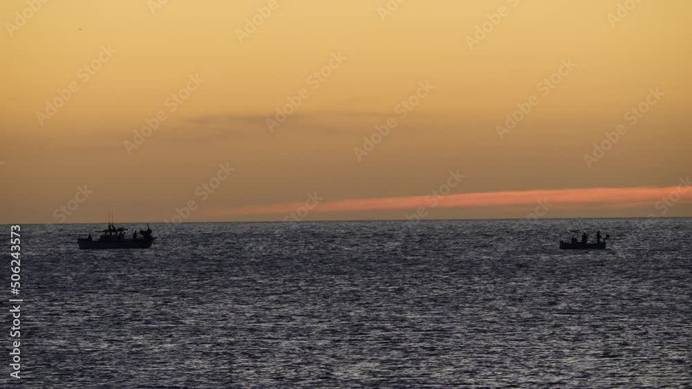 Fishing boats on sea water at sunrise. Seascape. Fishing boats on sea water at sunrise. Seascape.
