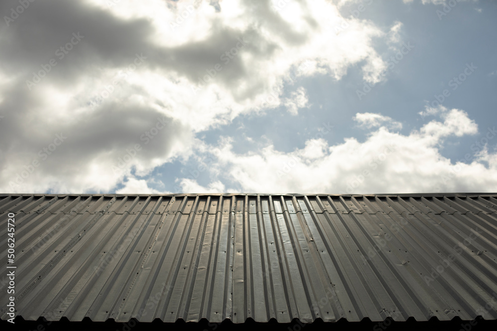 Roof of house is made of steel. Roof covering. Roof of house is made of steel. Roof covering.