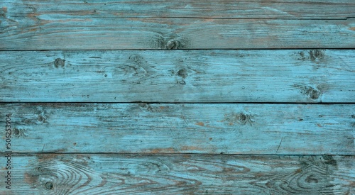 Background of old vintage cracked rough blue wood horizontal planks in Provence style