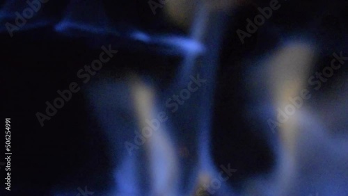 Indoor fire flames, flame dance and intense colors, controlled fire.
