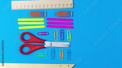 Back to school. School accessories on a background.