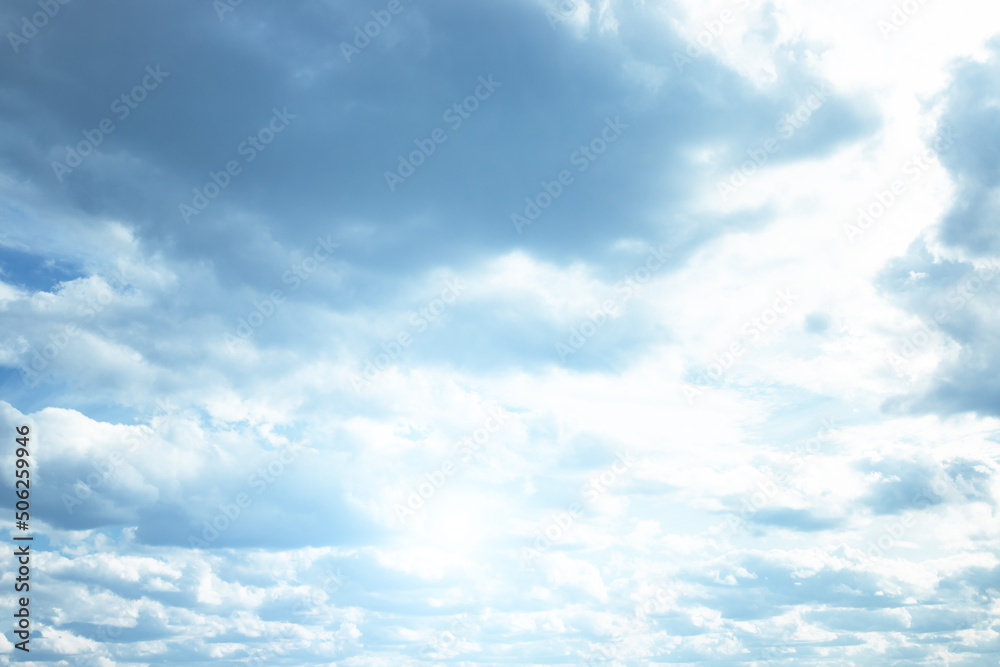 sky blue background, fluffy clouds on a summer day in sunlight sky blue background, fluffy clouds on a summer day in sunlight