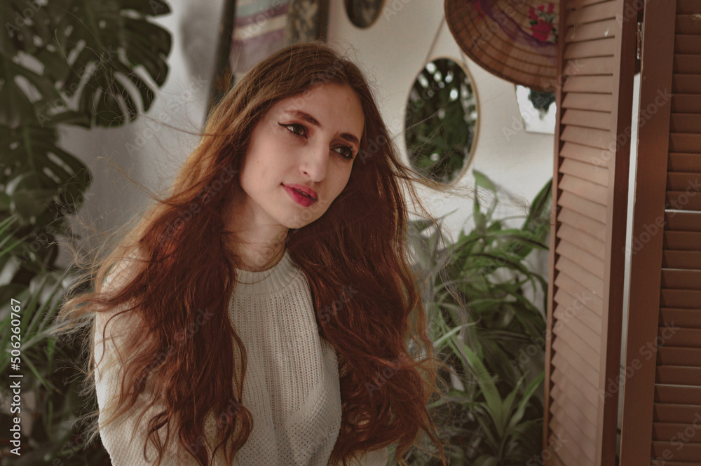 girl with long hair on the background of foliage girl with long hair on the background of foliage