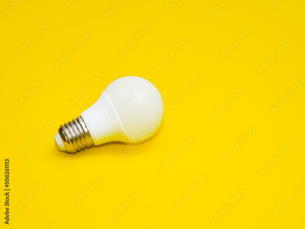 Light bulb isolated with yellow background. Light bulb isolated with yellow background.