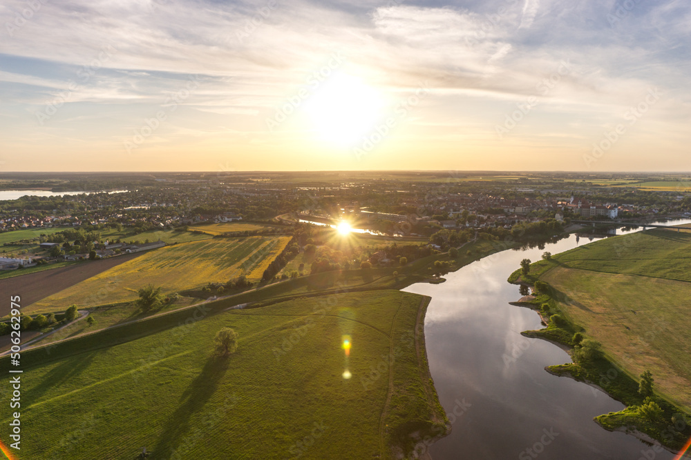 View of the Elbe and the city of Torgau at sunset. Saxony. Germany