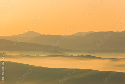 Wallpaper Mural Sunrise with fog over a valley in Tuscany - Italy V Torontodigital.ca