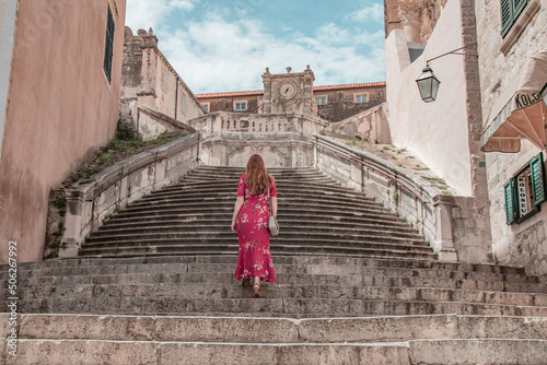 Woman wandering around the streets of Dubrovnik. © Tibi.lost.in.nature