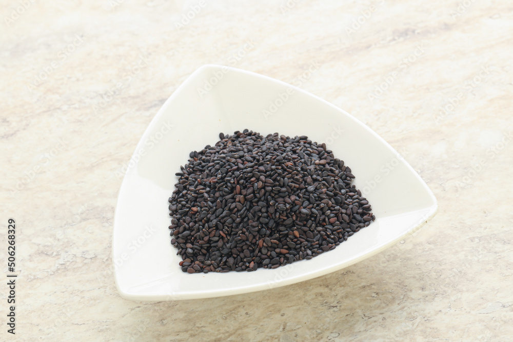 Black sesame seeds in the bowl Black sesame seeds in the bowl