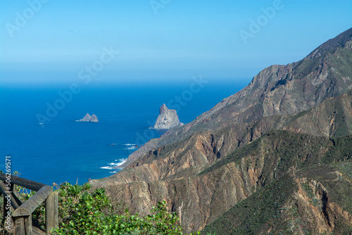 Panoramic view on green mountains and blue Atlantic ocean, Anaga national park near Tanagana village,  North of Tenerife, Canary islands, Spain photo