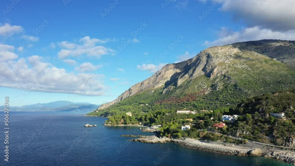The green countryside and the Tyrrhenian Sea in Europe, Italy, Basilicata, in summer, on a sunny day.