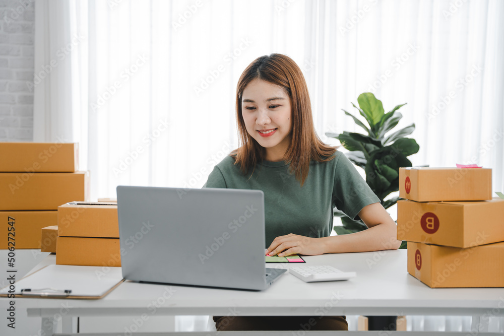 Small start-up business owners checking parcels at work, freelancers, salespeople, checking production orders. Pack products for delivery to customers Sell Ecommerce Shipping Ideas Small start-up business owners checking parcels at work, freelancers, salespeople, checking production orders. Pack products for delivery to customers Sell Ecommerce Shipping Ideas