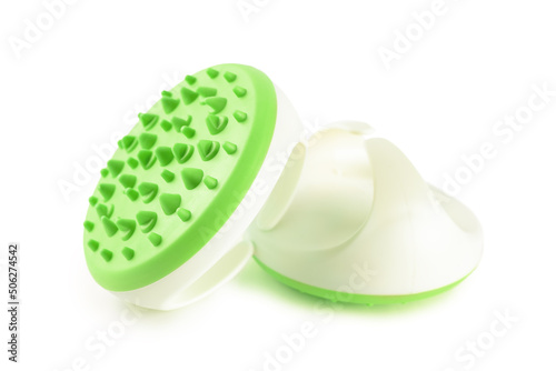 Hand massager with silicone spikes for anti-cellulite massage procedure isolated on white background. Massage brush tool for problem body zone, self-care, health care, body therapy.