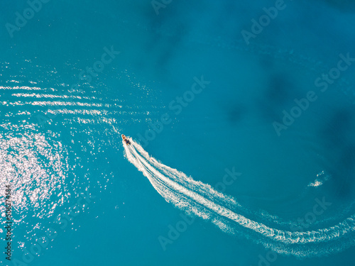 aerial view of speed boat in blue sea water