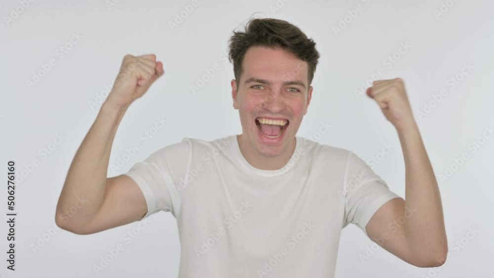 Successful Young Man Celebrating on White Background Successful Young Man Celebrating on White Background