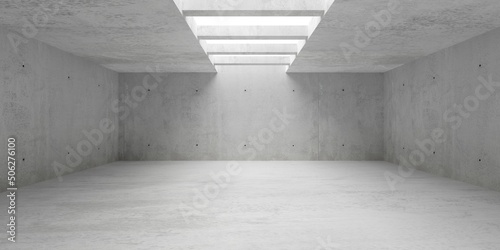 Abstract empty, modern concrete room with indirect lighting from ceiling beams and concrete floor - industrial interior background template