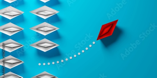 Red paper boat driving away from uniform group of white paper ships on blue background, difference or business leadership concept, flat lay top view from above