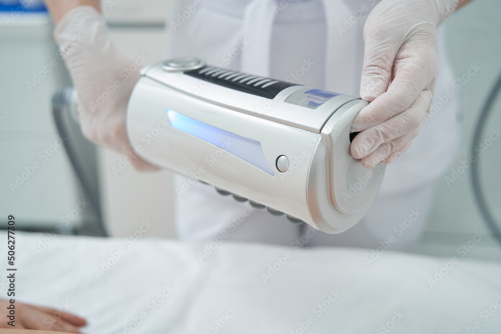 apparatus held in hands of beautician apparatus held in hands of beautician