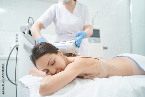 woman receives spa treatment