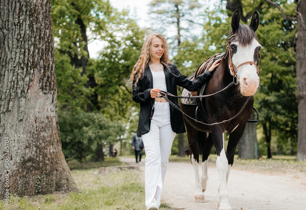 Beautiful girl with a horse for a walk Beautiful girl with a horse for a walk