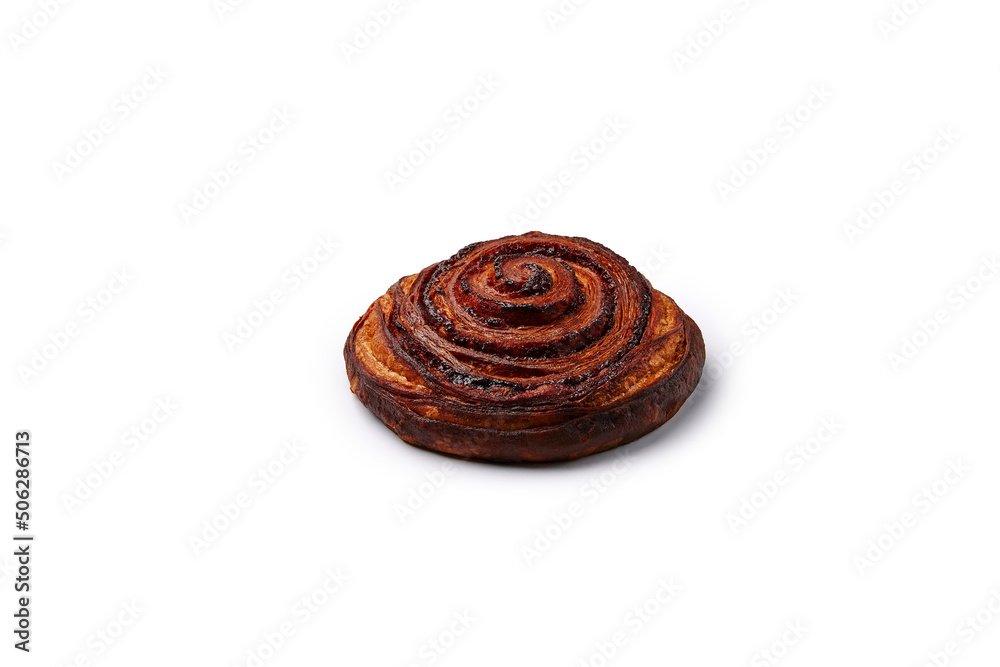 Rolled bun with aromatic cinnamon isolated on white Rolled bun with aromatic cinnamon isolated on white