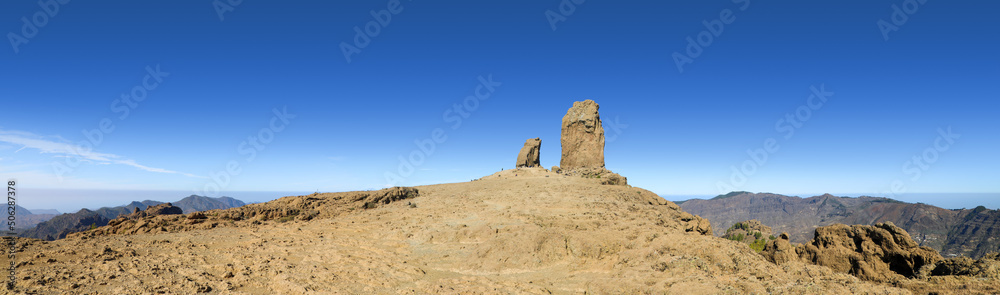Panoramic view of Roque Nublo upon the barren mountaintop Panoramic view of Roque Nublo upon the barren mountaintop