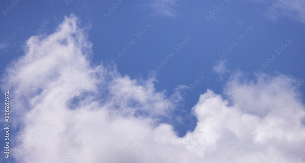 View of Cloudscape during a cloudy blue sky sunny day. Taken on the West Coast of British Columbia, Canada. View of Cloudscape during a cloudy blue sky sunny day. Taken on the West Coast of British Columbia, Canada.
