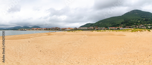 View of Santoña from El Puntal and Laredo beach in Cantabria, Spain photo