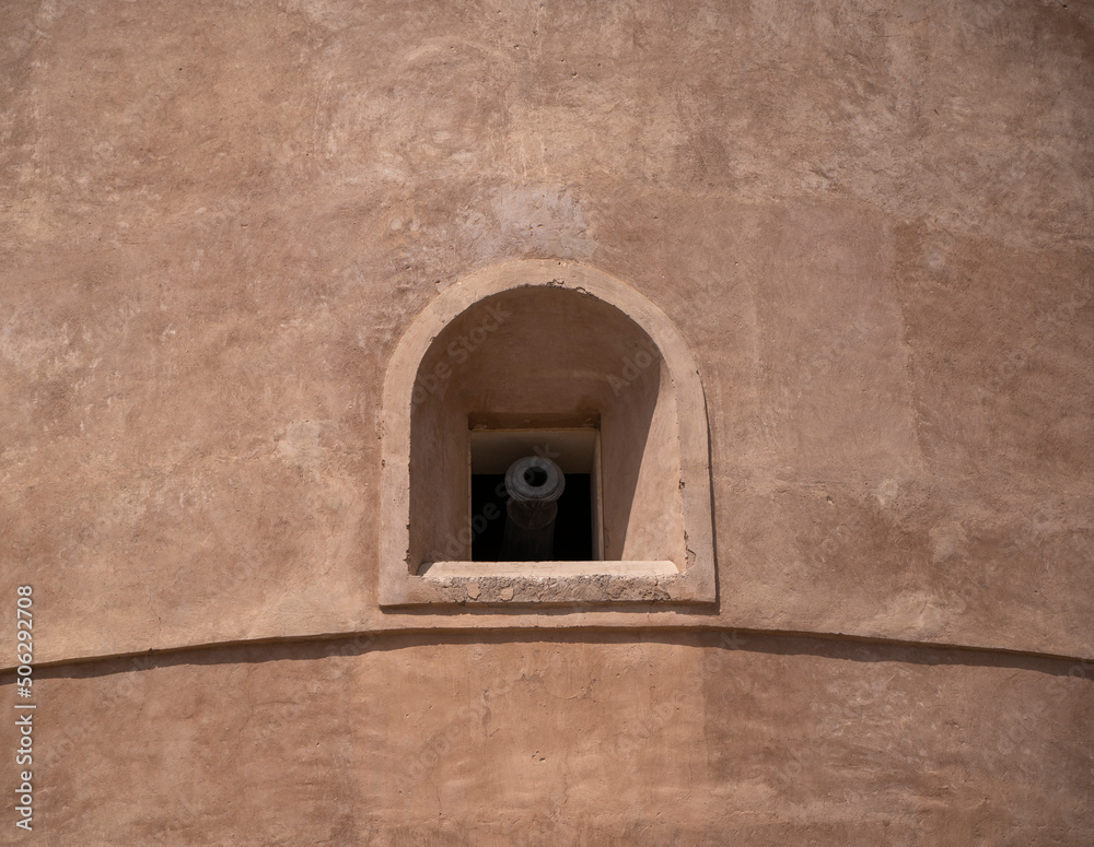 Fototapeta premium cannon window, Hazm castle in Rustaq in Oman