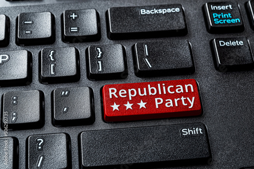 Republican Party red key on a decktop computer keyboard. Concept of voting online for Republican Party, politics, United States elections. Laptop enter key with Republican Party word message. photo