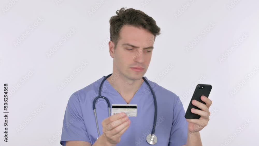 Online Shopping on Smartphone by Young Doctor on White Background Online Shopping on Smartphone by Young Doctor on White Background